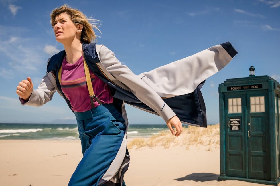 Jodie Whittaker's Thirteenth Doctor running from the TARDIS to investigate in Praxeus [Credit: BBC Studios]